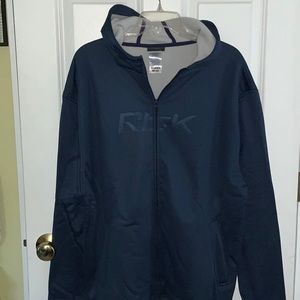NWOT! Men’s Reebok Full Zip Lined Jacket with hood. Size Large. Blue.